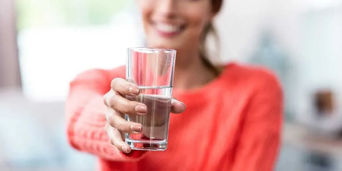 girl holding water