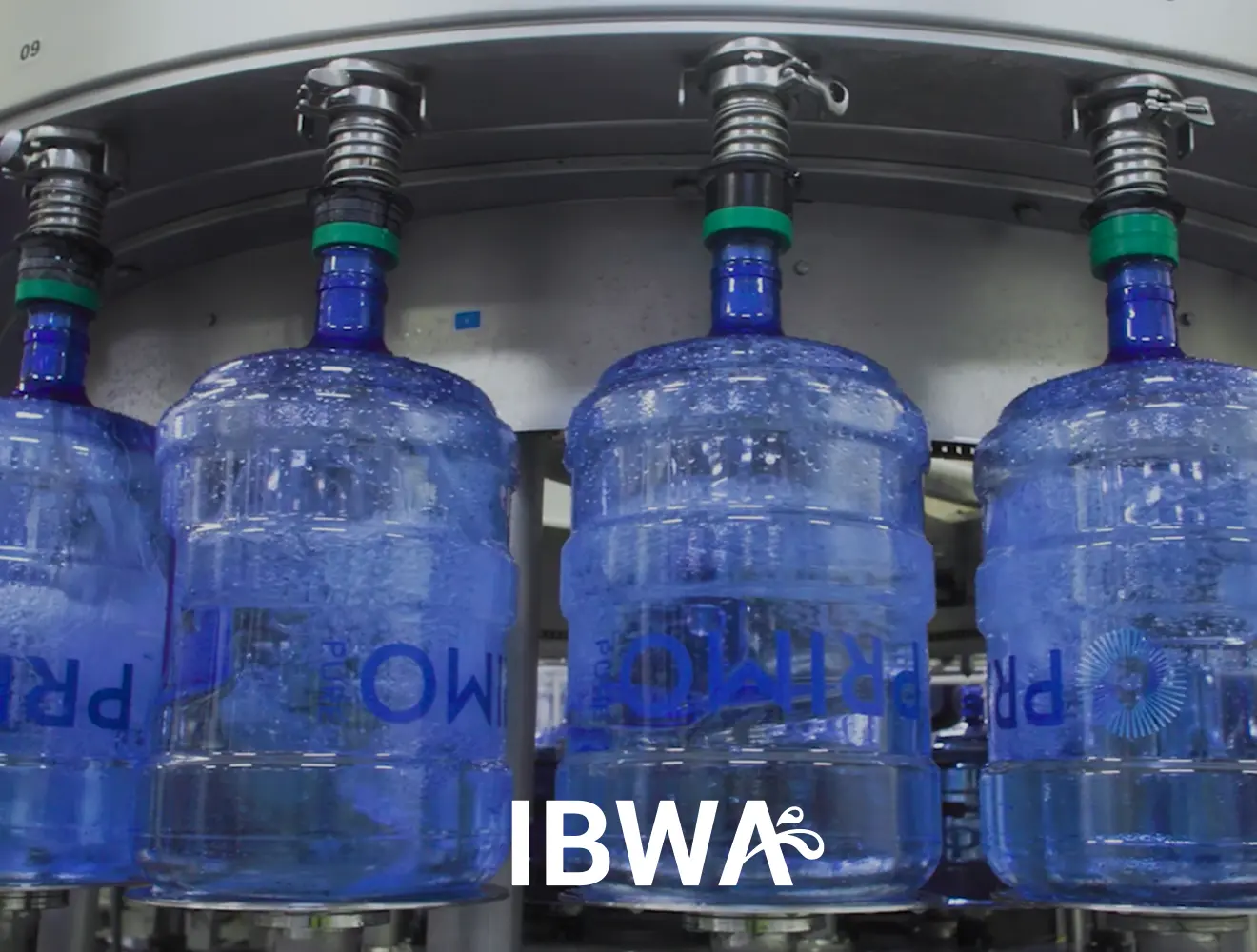 Primo Water Bottles being filled with IBWA logo