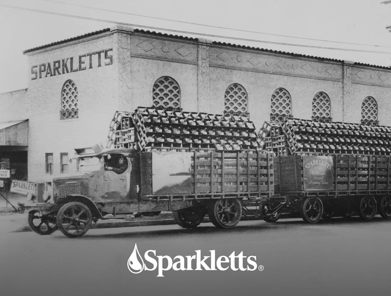 Vintage Sparkletts building & water delivery truck with Sparkletts logo