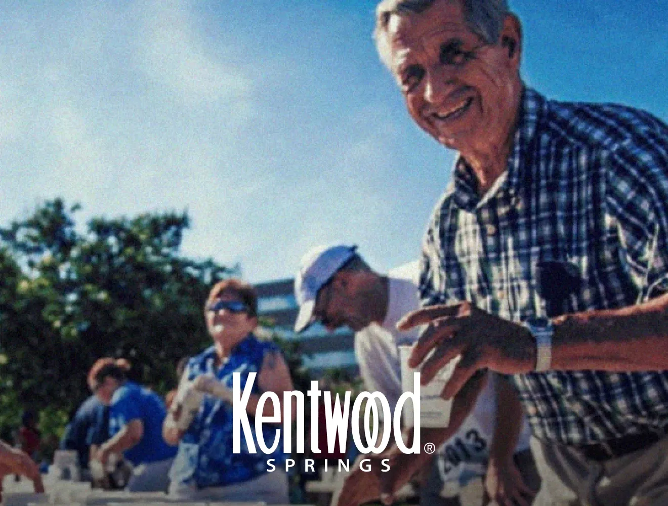 Vintage image of people with Kentwood Springs logo