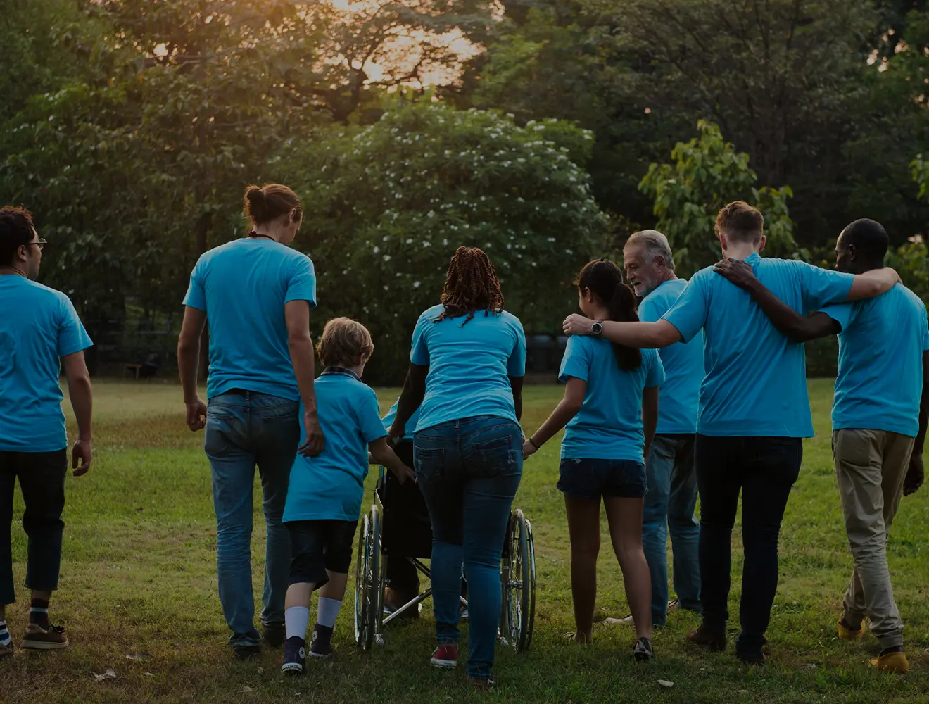 Group in blue shirts giving back to their community