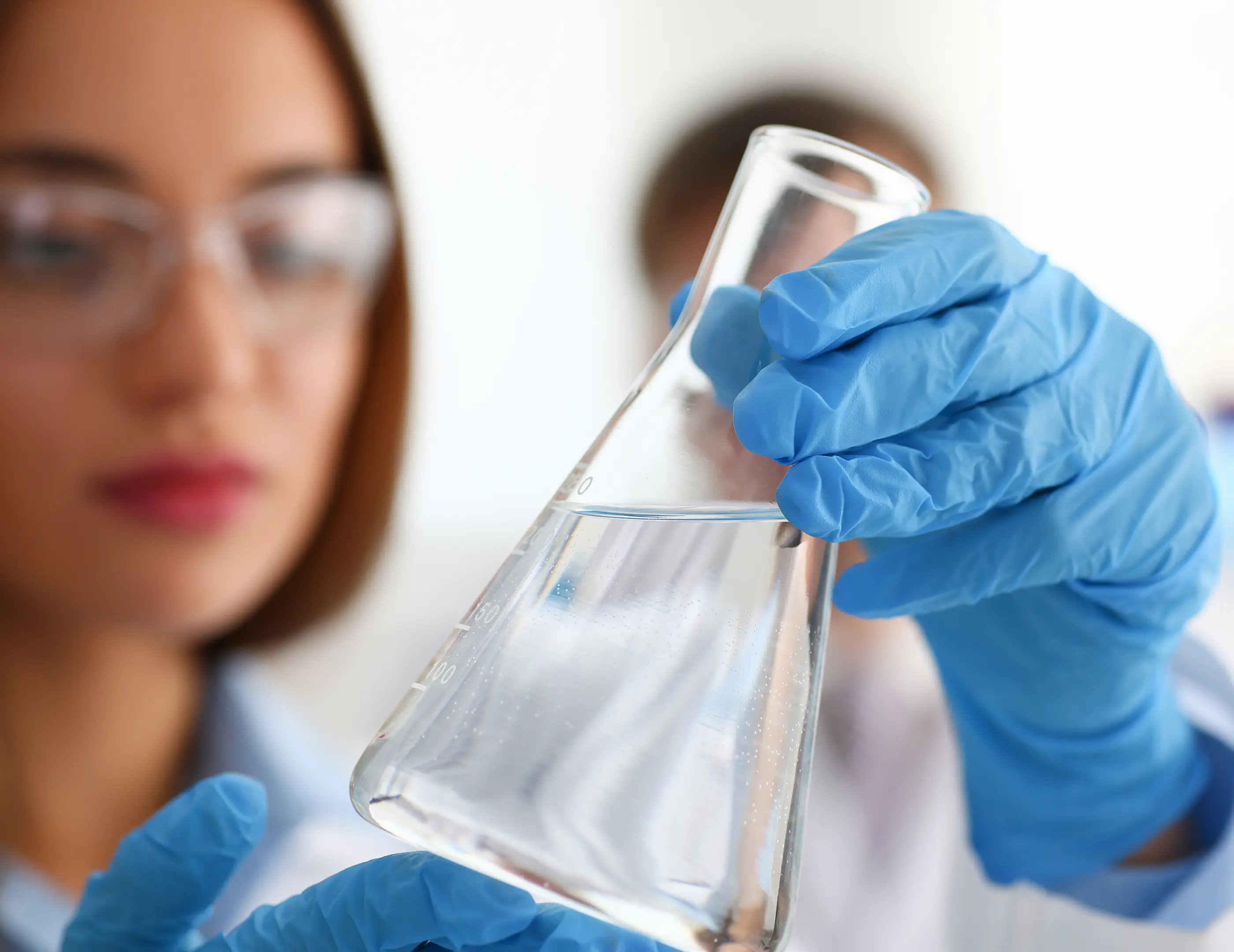 Woman testing water quality in a laboratory